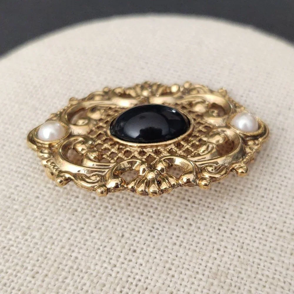 Vintage gold, black and faux pearl brooch